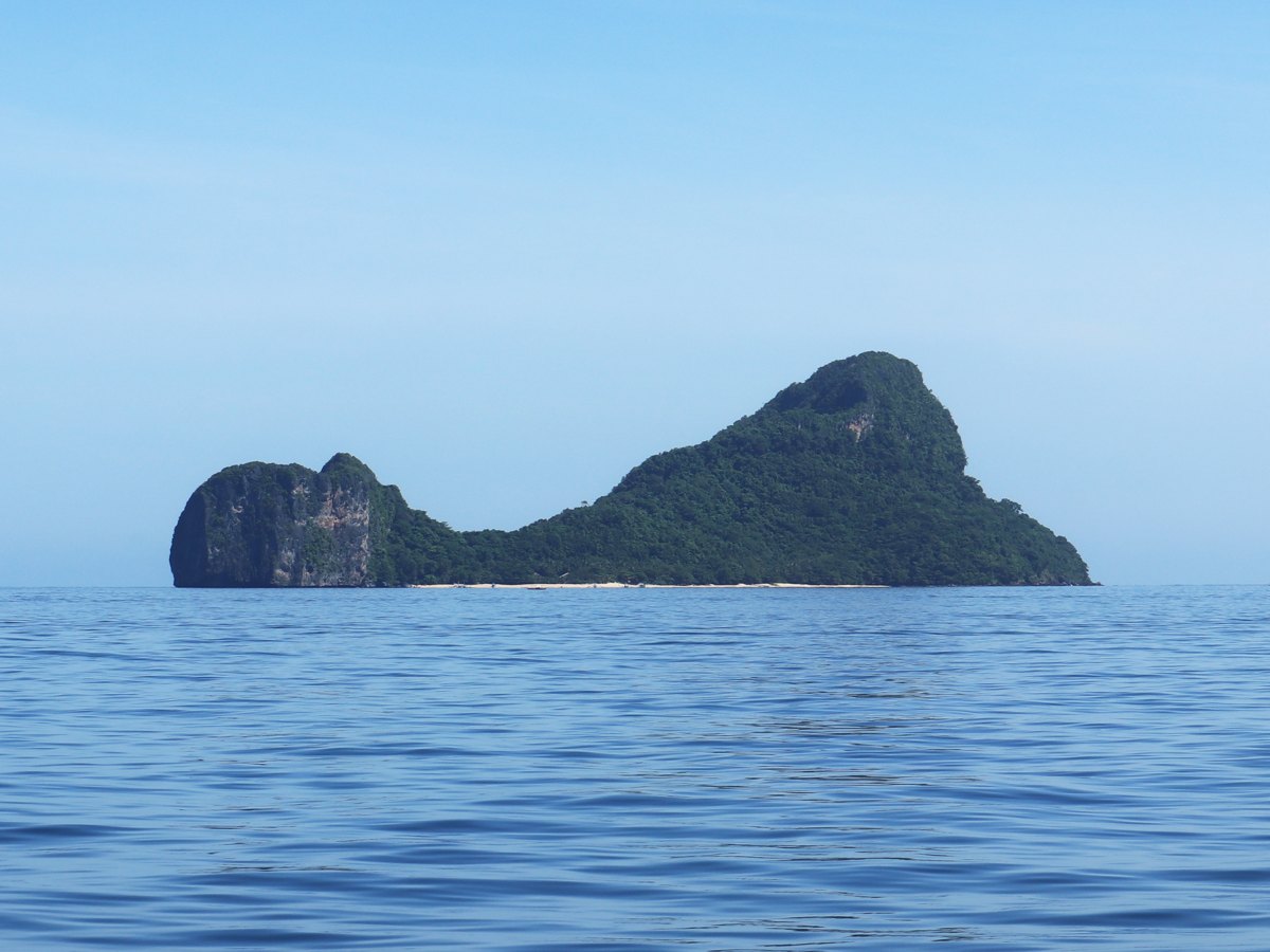 Dilumacad Island, also known as Helicopter Island, seen from the sea